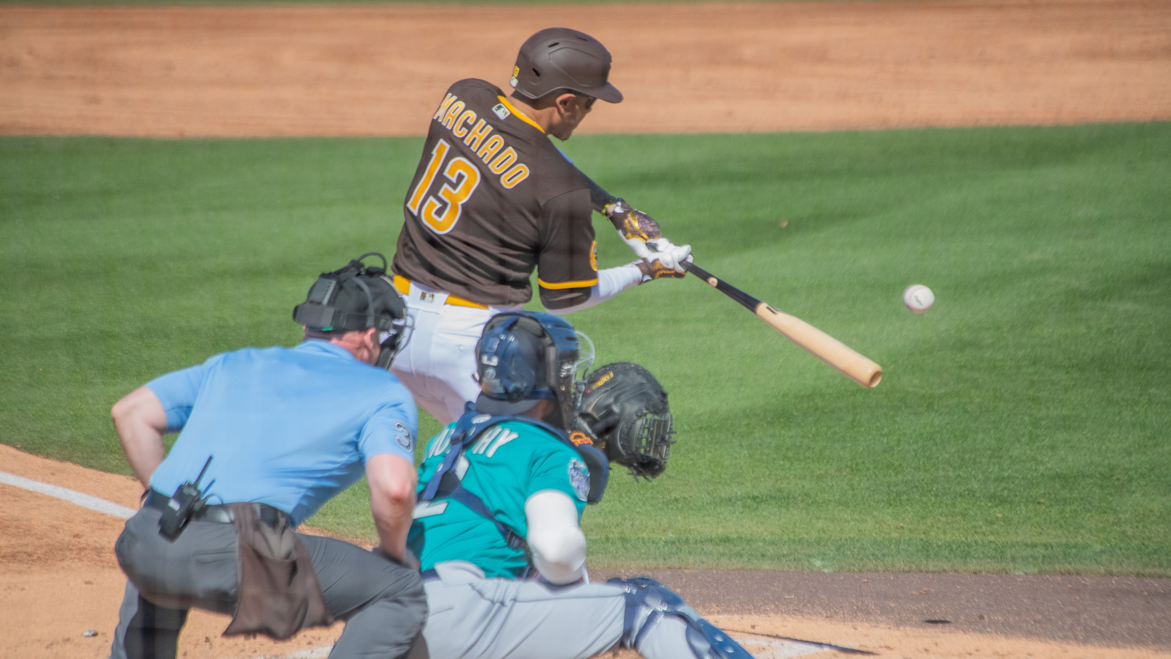 Manny Machado takes a swing during a Spring Training game with the Seattle Mariners at Peoria Sports Complex.