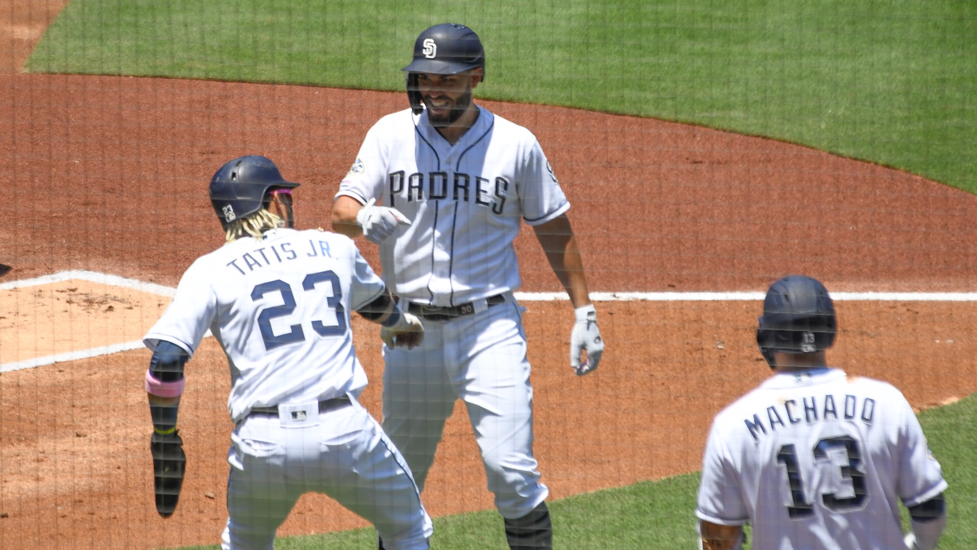 Eric Hosmer celebrates his homerun with Fernando Tatis Jr.